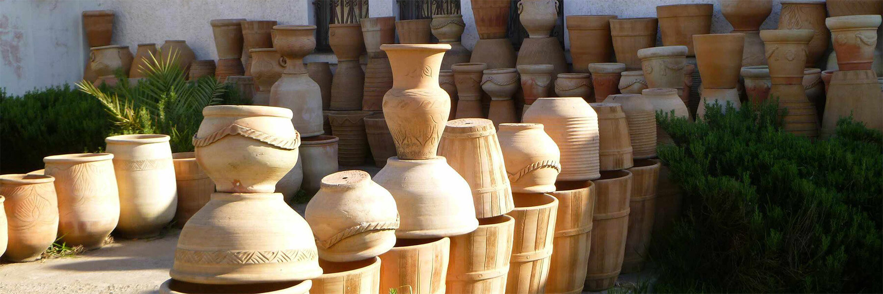 pallets of empty clay pots